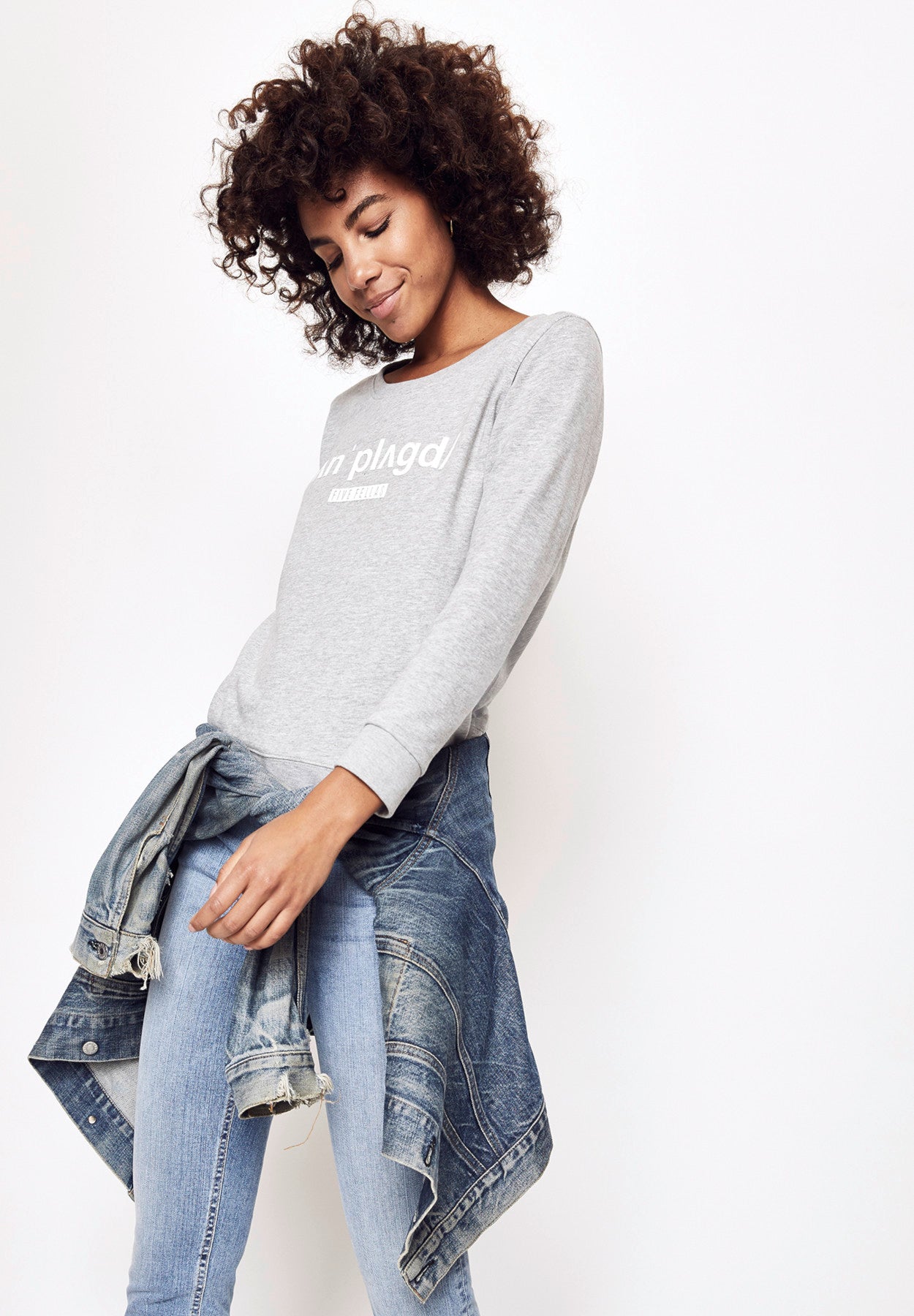 Sweatshirt and ripped jeans hot sale